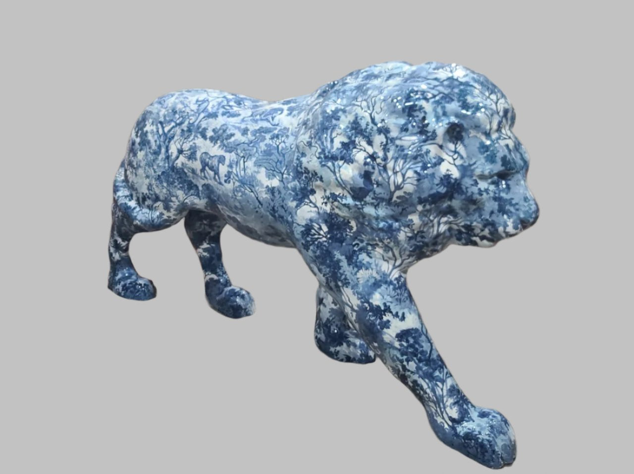 Porcelain Majesty: Blue Lion Sculpture